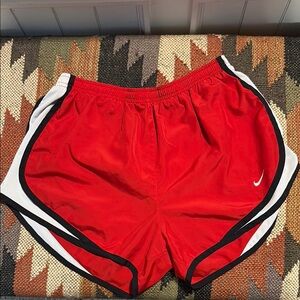 Nike Red Athletic Shorts with Curved Hem